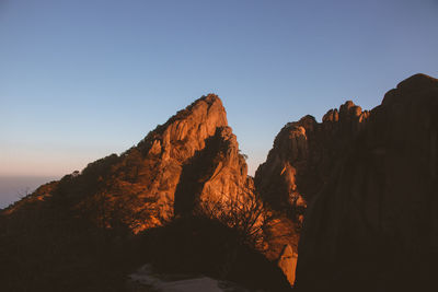 Scenic view of mountains against clear sky