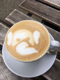 High angle view of cappuccino on table