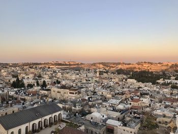 High angle view of townscape against sky during sunset