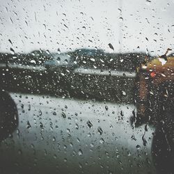 Full frame shot of wet car window