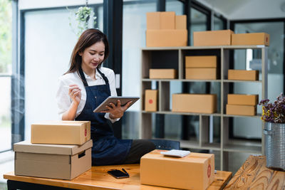 Portrait of young businesswoman working in office