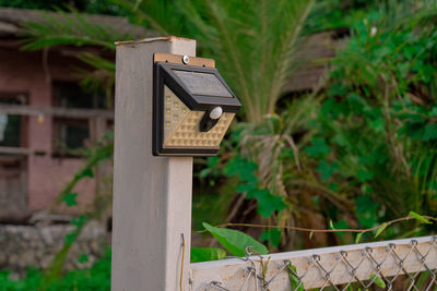 Close-up of birdhouse on wood