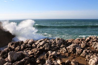 Waves splashing on rocks