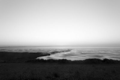 Scenic view of sea against clear sky