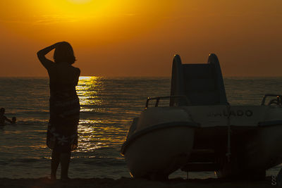 Scenic view of sea at sunset