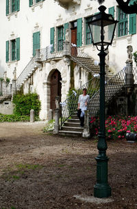 Full length of woman standing in city