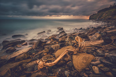 Scenic view of sea against sky at sunset