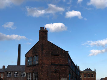 Low angle view of old building against sky