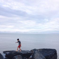 Man standing on cliff