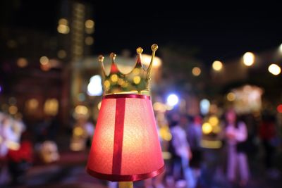 Close-up of illuminated christmas decorations at night