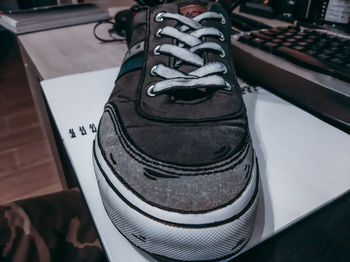 High angle view of shoes in restaurant