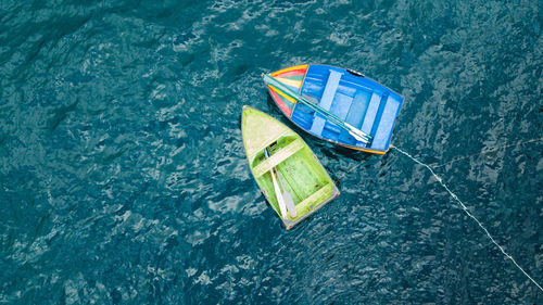 High angle view of boats floating on lake