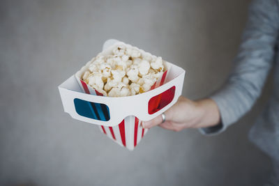 Midsection of woman holding ice cream