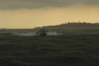 Scenic view of sea against sky during sunset