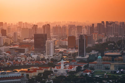 High angle view of buildings against sky during sunset