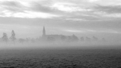 Built structure against cloudy sky