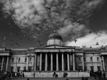 View of historic building against cloudy sky