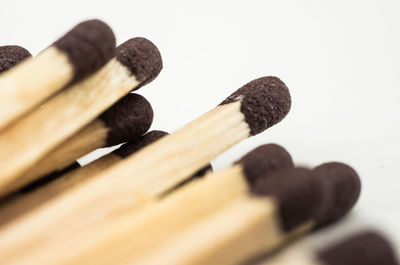 Close-up of wood against white background