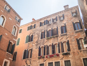 Low angle view of old building against sky