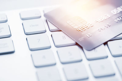 Close-up of credit card on computer keyboard