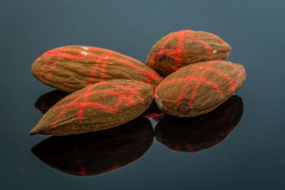 Close-up of almonds on gray background