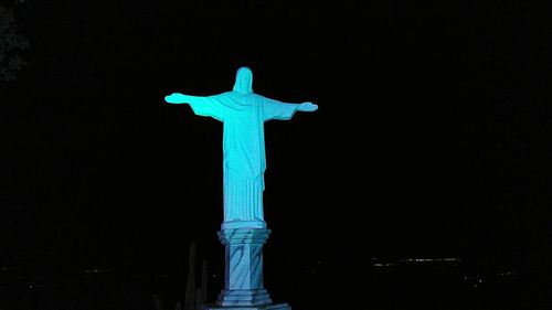 Low angle view of statue in the dark