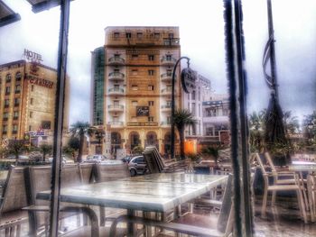 Reflection of buildings on glass window