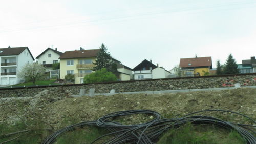 Close-up of houses against sky