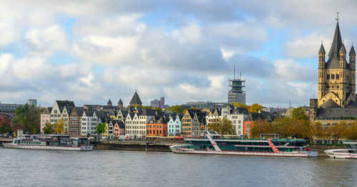 Boats in sea against sky