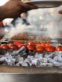 Close-up of person preparing food