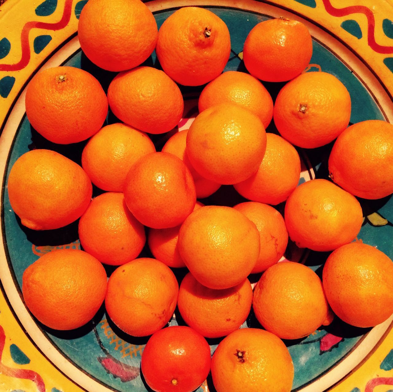 food and drink, food, freshness, healthy eating, orange color, indoors, fruit, still life, orange - fruit, large group of objects, abundance, full frame, for sale, high angle view, close-up, yellow, pumpkin, vegetable, red, retail