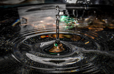 Close-up of drop splashing in water