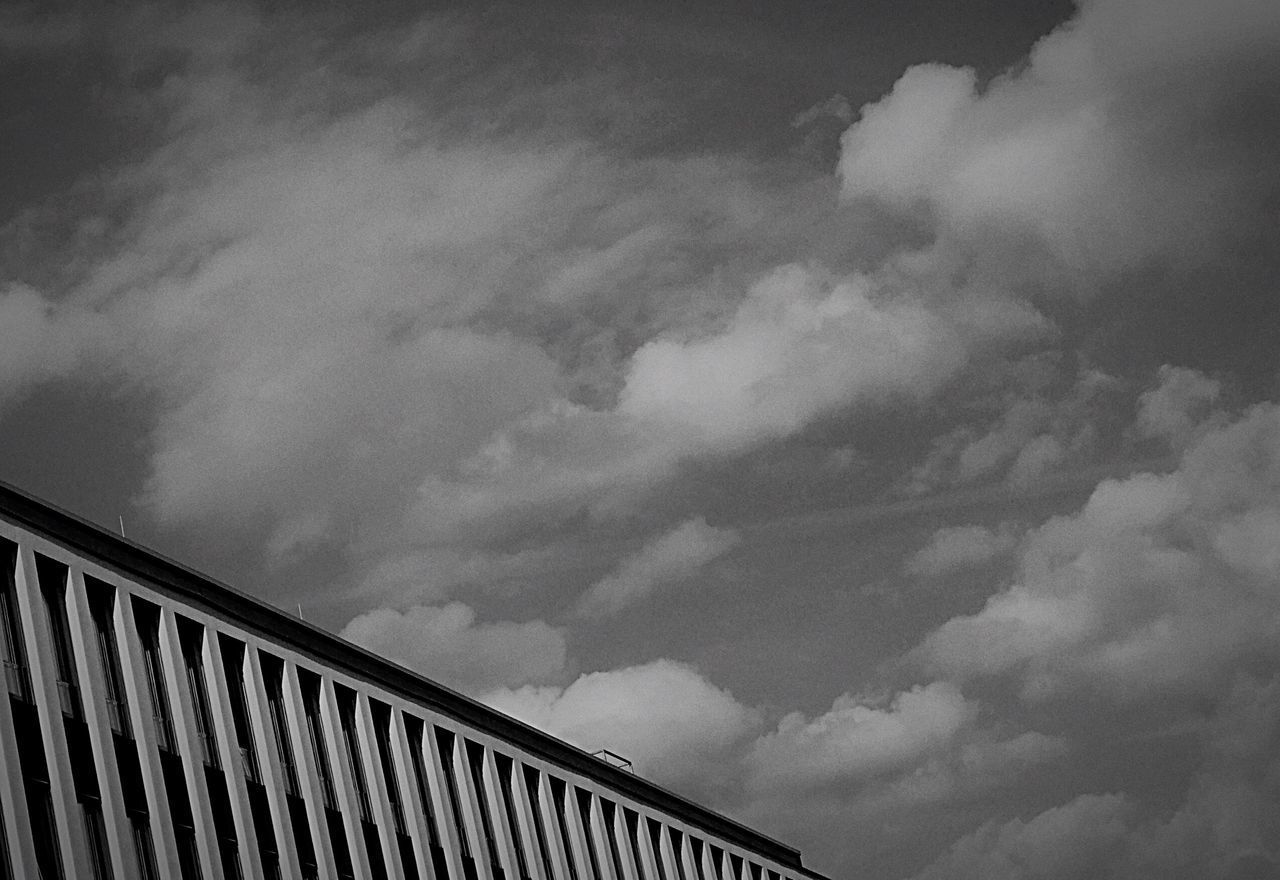 LOW ANGLE VIEW OF BUILT STRUCTURE AGAINST THE SKY