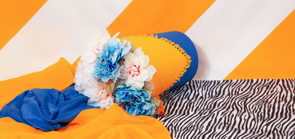 High angle view of multi colored umbrella on wall