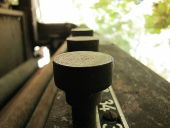 Close-up of metallic object against blurred background