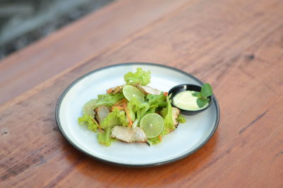 High angle view of food in plate on table