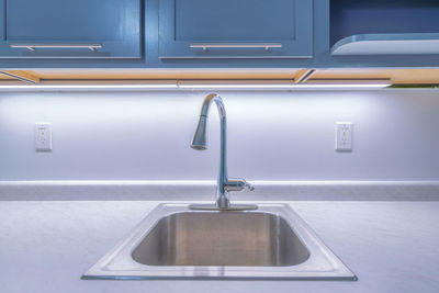 Close-up of sink in bathroom