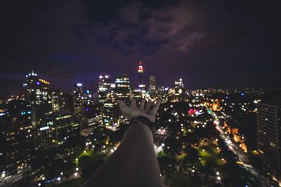 Illuminated cityscape at night