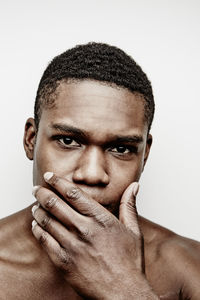 Portrait of young man, studio shot