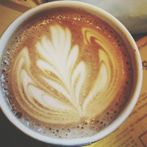 Close-up of coffee cup on table