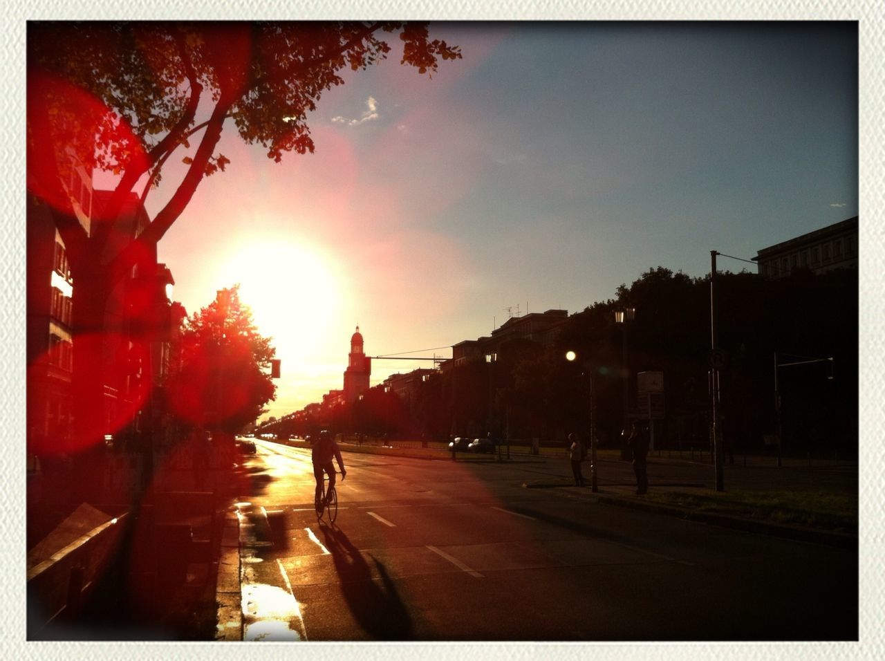 VIEW OF CITY STREET AT SUNSET