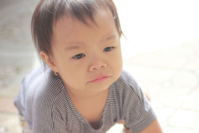 Portrait of cute boy looking away