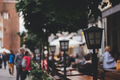 People walking on street in city