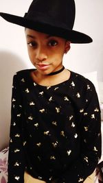 Portrait of cute girl wearing hat