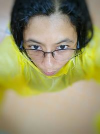 Close-up portrait of mature woman wearing eyeglasses