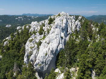 Scenic view of rocky mountains against sky