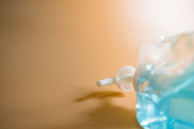 Close-up of water bottle on table