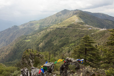 Buntings on mountains against sky