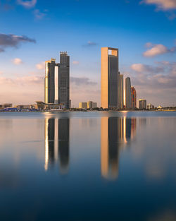 View of abu dhabi skyline at sunrise, united arab emirates