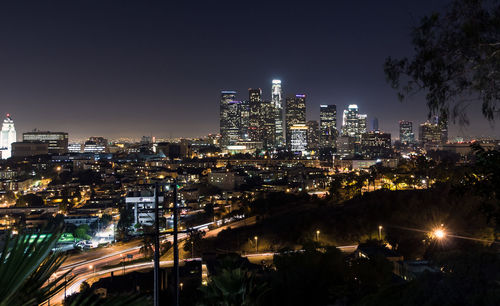 Illuminated cityscape at night